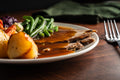 Roast lamb in mint gravy