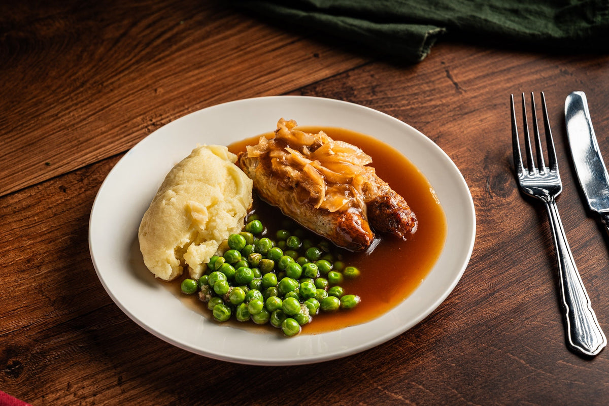 Pork Sausages with Creamy Mash & Onion Gravy